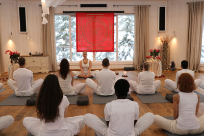 tantra yoga - Liisa guiding a group Tantra Yoga class